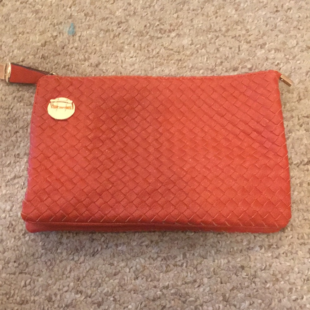 multi use burnt orange handbag
